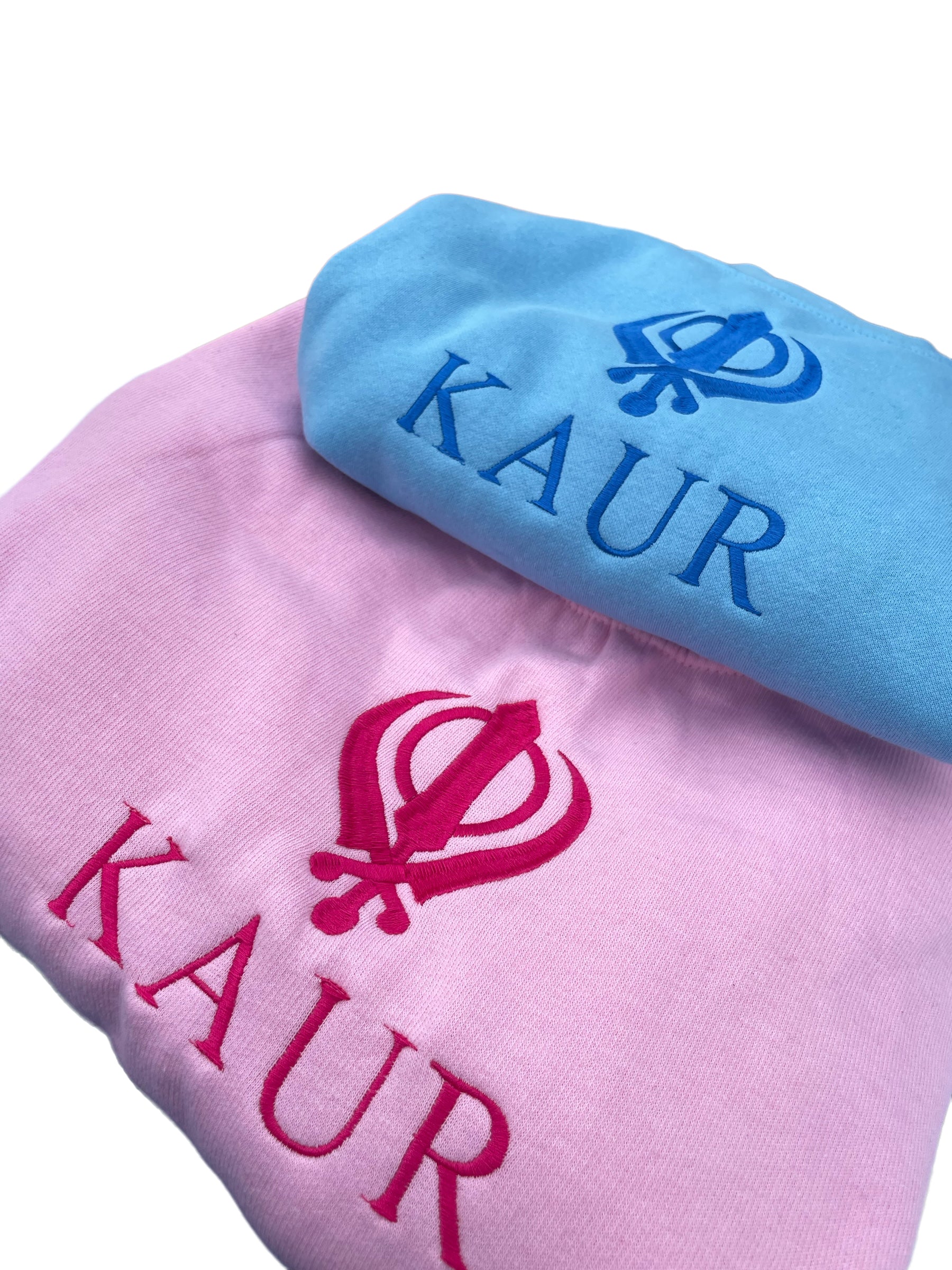 The embroidered KAUR sweater is available in Blue or Pink fabric. Perfect for any young Kaur wanting to incorporate their love of Sikhi with everyday fashion. The intricate embroidery adds a touch of elegance to this cozy piece, making it both stylish and comfortable.
