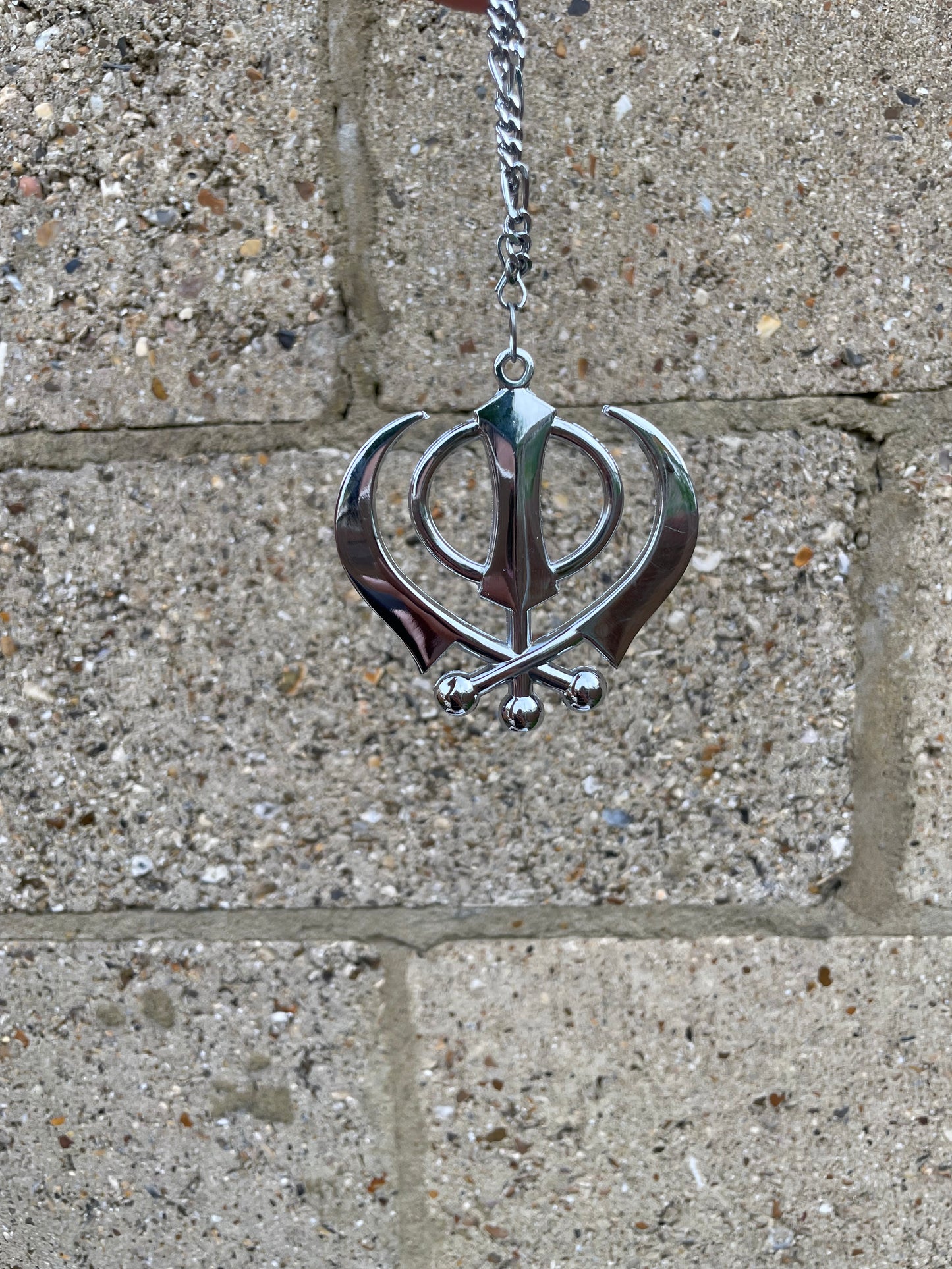 Transform your vehicle into a symbol of strength and spirituality with our meticulously crafted Khanda Car Emblem. This stunning piece not only adds a touch of elegance to your car but also proudly showcases your Sikh heritage.
This Khanda Car Emblem is perfect for anyone looking to personalize their vehicle with a meaningful symbol of Sikh faith and culture.
Perfect gift for Sikh community members and enthusiasts who want to display their faith and pride in a stylish and modern way.